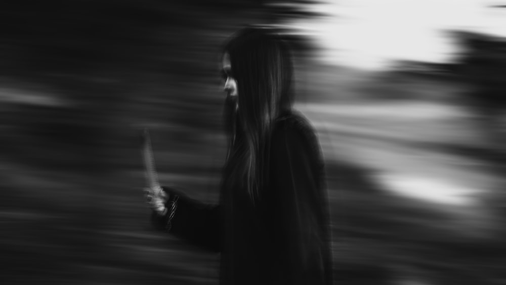 A blurry image of a woman