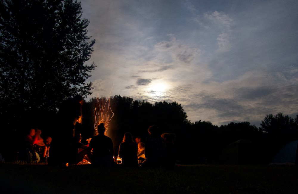 A group of people around a bonfire
